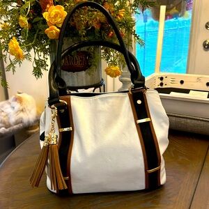 Call It Spring is the brand of the bag in white, brown and black leather